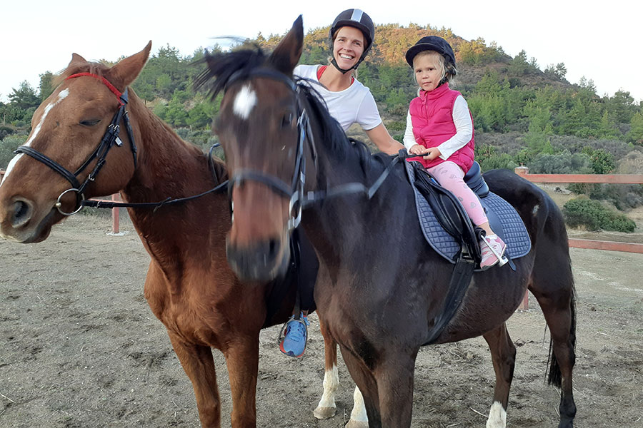 Photo of Mum and daughter riding horses