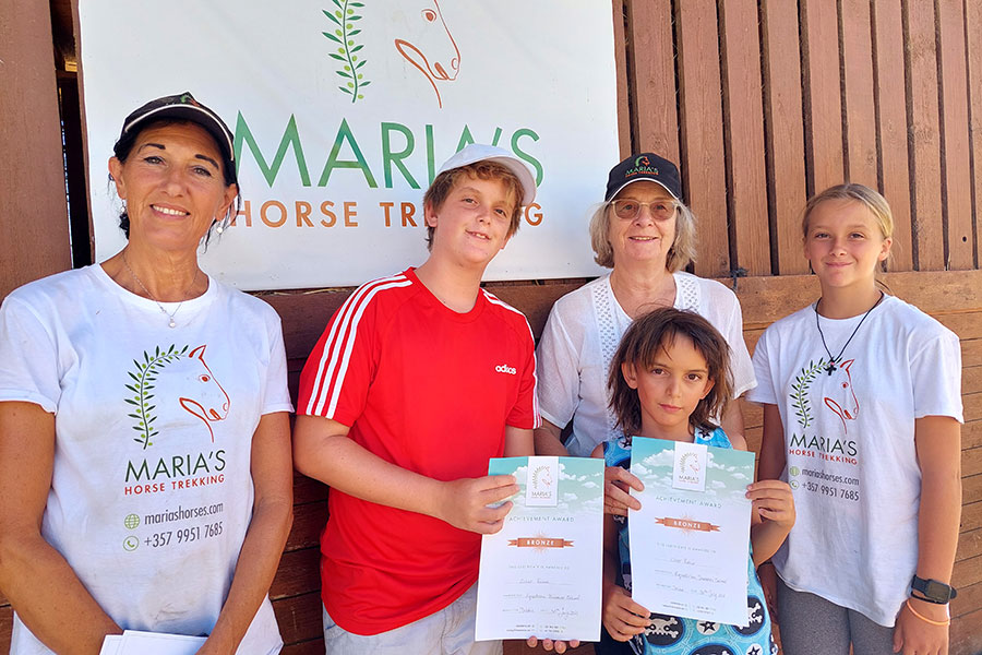 Photo of two riders with their bronze certificates